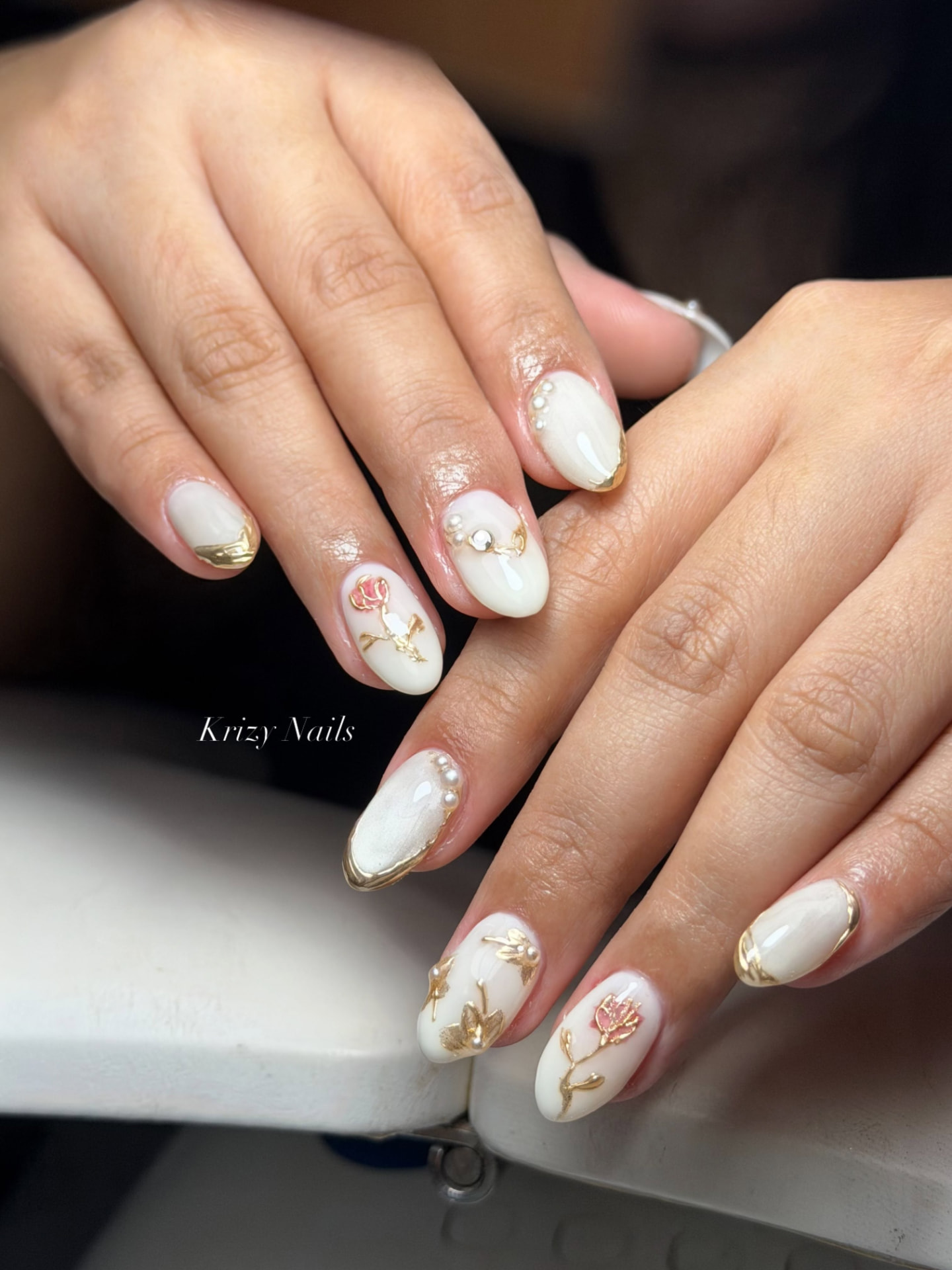 Gold Leaf Study nail design — Hand-sculpted gold florals over a creamy milk base.